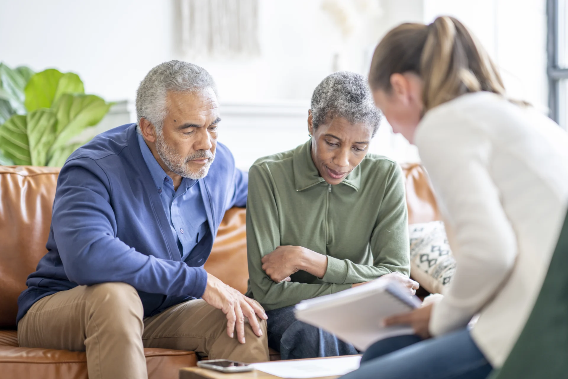 A couple being helped with executor assistance after losing a loved one.